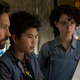 Paul Rudd's Mr. Grooberson, Logan Kim's Podcast, and Mckenna Grace's Phoebe look at a computer together in Ghostbusters: Afterlife.